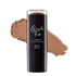The image shows a stick of DB Cosmetics Quick Fix Cream Foundation in a shade of warm honey, with a swatch of the foundation color next to it.